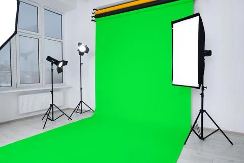 Chroma key compositing. Green backdrop and equipment in studio Stock Photos
