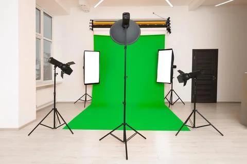 Chroma key compositing. Green backdrop and equipment in studio Stock Photos