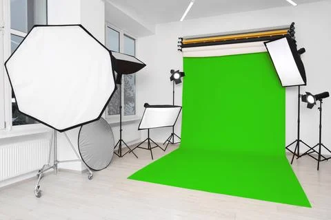 Chroma key compositing. Green backdrop and equipment in studio Stock Photos