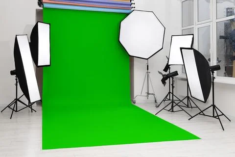 Chroma key compositing. Green backdrop and equipment in studio Stock Photos