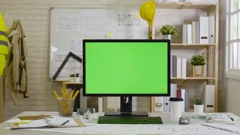 Chroma key on computer screen in cozy indoor room Stock Photos
