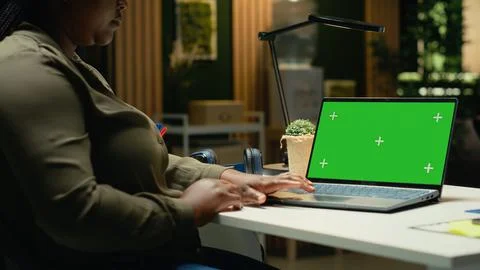 Chroma key display on laptop with black woman manager solving management Stock Photos