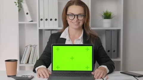 Chroma key green screen layout. Confident woman in office with documents and Stock Footage 260317607