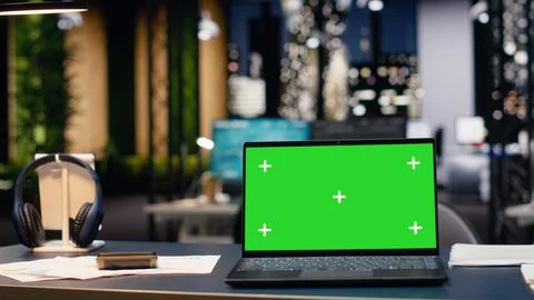 Chroma key on laptop in empty office interior with open space layout Stock Photos