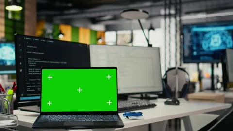 Chroma key laptop in empty startup office with artificial intelligence program Stock Footage 322699730