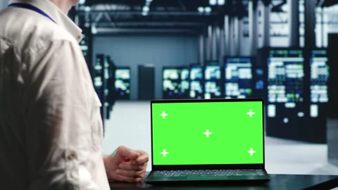 Chroma key laptop servers optimizing Stock Footage 249968786