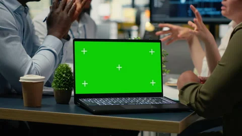 Chroma key laptop used by tech startup office engineer doing meeting Stock Footage 323406556