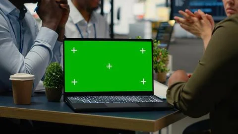 Chroma key laptop used by tech startup office engineer doing meeting Stock Photos