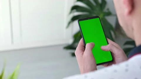 Chroma key mock-up on smartphone in hand. Stock Footage 170577435
