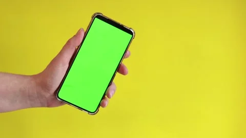 Chroma key mockup on smartphone in hand Stock Footage 271648482