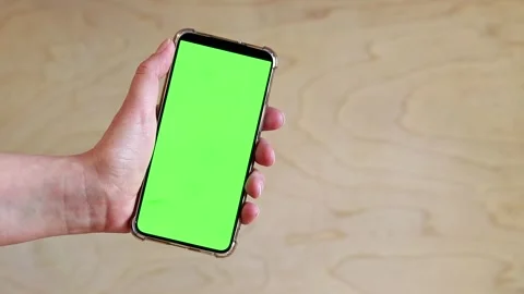 Chroma key mockup on smartphone in hand 스톡 동영상 271648770