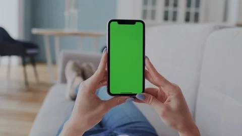 Chroma Key or Mock-up Tracking Touchscreen on Cellphone. Young Woman Lying on Stock Footage 122418241