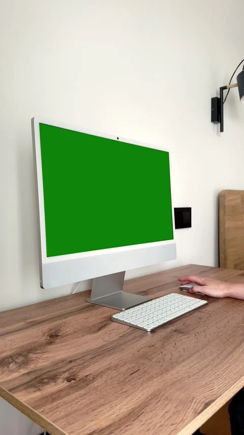 Chroma key screen computer display resting on wooden table. Freelance emplo.. Stock Footage 344049968