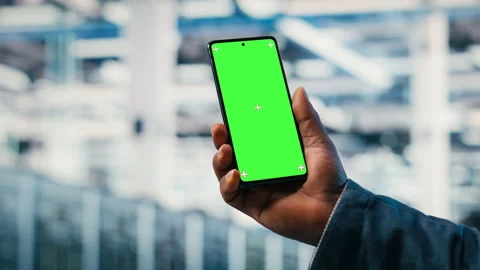 Chroma key smartphone used by server room employee to monitor electronics Stock Footage 330206866