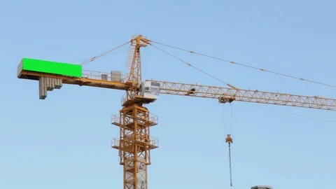Chroma key on working crane .Panorama of a working crane against a beautiful sky Stock Footage 89498909