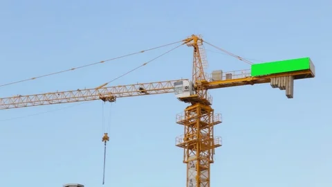 Chroma key on working crane .Panorama of a working crane against a beautiful sky Stock Footage 89498922