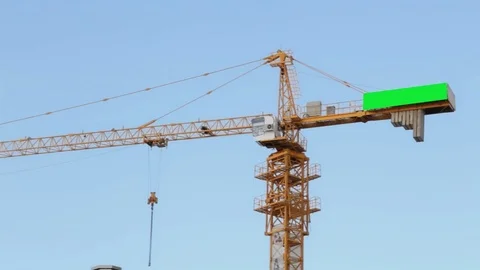 Chroma key on working crane .Panorama of a working crane against a beautiful sky Stock Footage 89498942