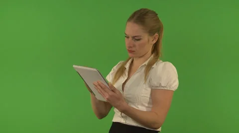 Chroma Key. Young woman using a tablet Stock Footage 35420448