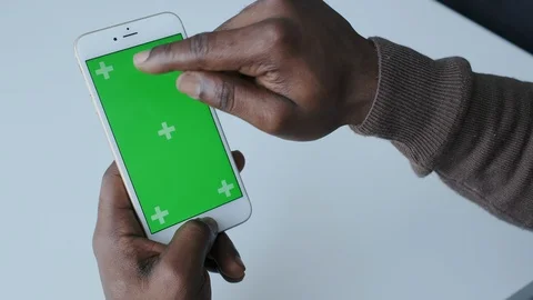Chromakey Tracking or Green Screen Display. African American Man Touches digital Stock Footage 120685074