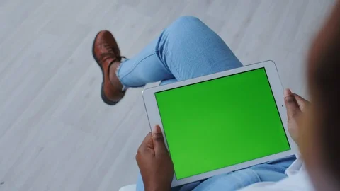 Chromakey Tracking or Green Screen Display. African American Adult Girl Holding Stock Footage 121097757