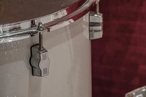 Chromatic Drum Hardware Close-Up with Red Background Stock Photos