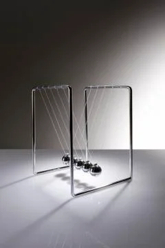 Chrome balancing spheres know as Newton's Cradle (pendulum) Stock Photos