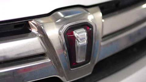 Chrome car grille with a distinctive central emblem and logo. Stock Footage 343902186