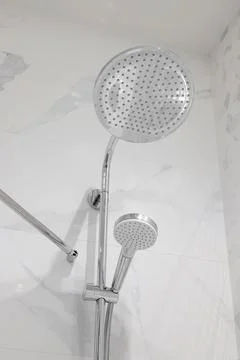 Chrome chower head close-up in the shower room Foto stock