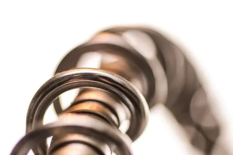 Chrome coiled spring abstract background - silver coil spring Stock Photos