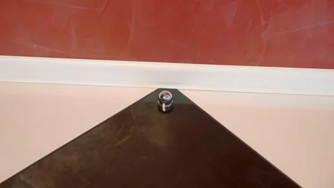 Chrome door stopper protecting the wall from damage by the door handle Video stock 297781840