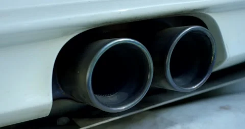 Chrome Dual Exhaust Tips on a Car in Close Up Video stock 340261784