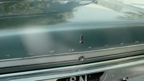 Chrome Lettering And Emblem On The Rear Trunk Of A Vintage Car Stock Footage 343697482