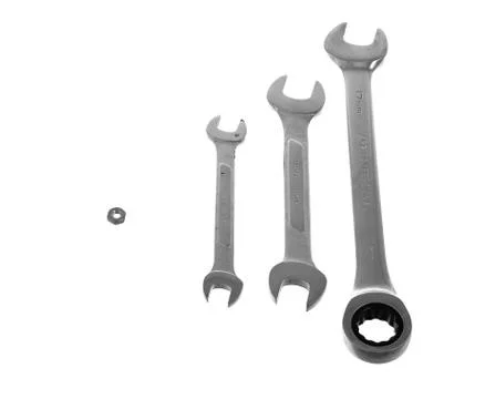 Chrome nut and wrenches. wrong size concept. Stock Illustration