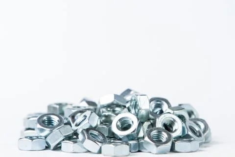 Chrome nuts on plain background Stock Photos