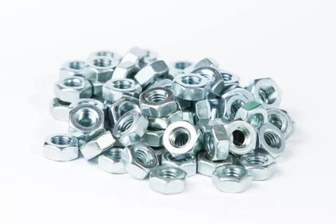 Chrome nuts on plain background Stock Photos