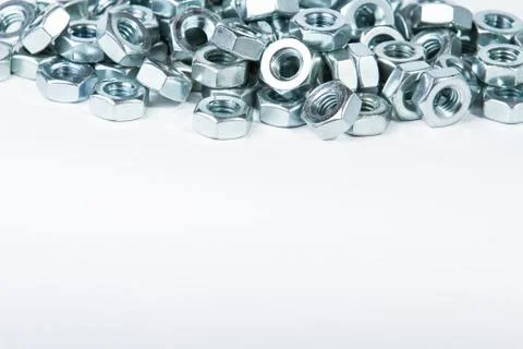 Chrome nuts on plain background Stock Photos