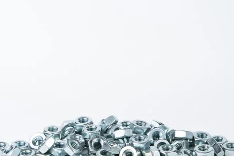 Chrome nuts on plain background Stock Photos