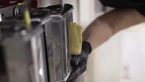 Chrome pasta machine processed Italian spaghetti. Reels. Stock Footage 236418489