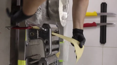 Chrome pasta machine processed Italian spaghetti. Reels. Stock Footage 247778160