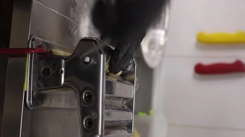 Chrome pasta machine processed Italian spaghetti. Reels. Stock Footage 262007846