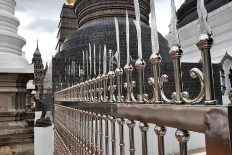 Chrome railing crowned with assorted blades, Wat Ban Den. Chiang Mai province Stock Photos