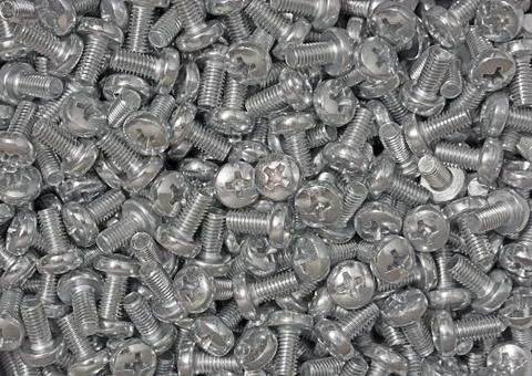 Chrome screws. Stock Photos