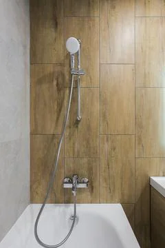 Chrome shower system close-up in a bathroom Stock Photos
