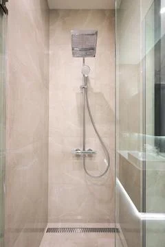 Chrome shower system on tile 스톡 사진