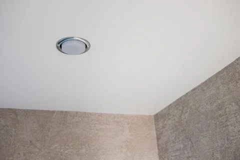 Chrome soffit in white ceiling with brown walls with copy space Stock Photos