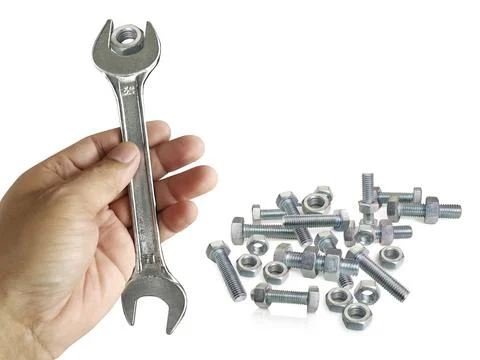 Chrome spanner with nut and bolt Stock Photos