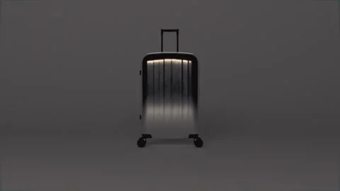 Chrome Suitcase in Dark Luxury Studio with Moving Light Stock Footage 311852523