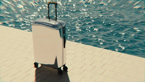 Chrome Suitcase by Luxury Poolside with Rippling Water Stock Footage 311852583