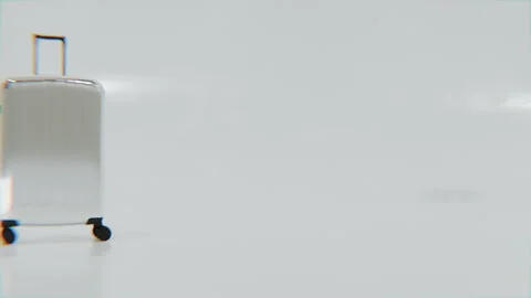 Chrome Suitcase Sliding Seamlessly in Studio Loop Stock Footage 311852547