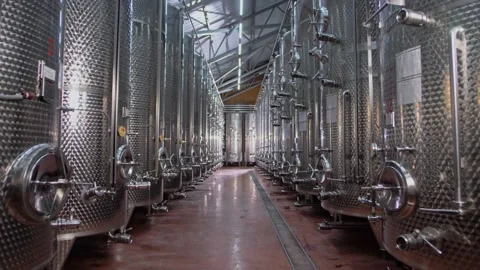 Chrome tanks for storing and fermenting wine products. Modern clean wine plant Stock Footage 270058515
